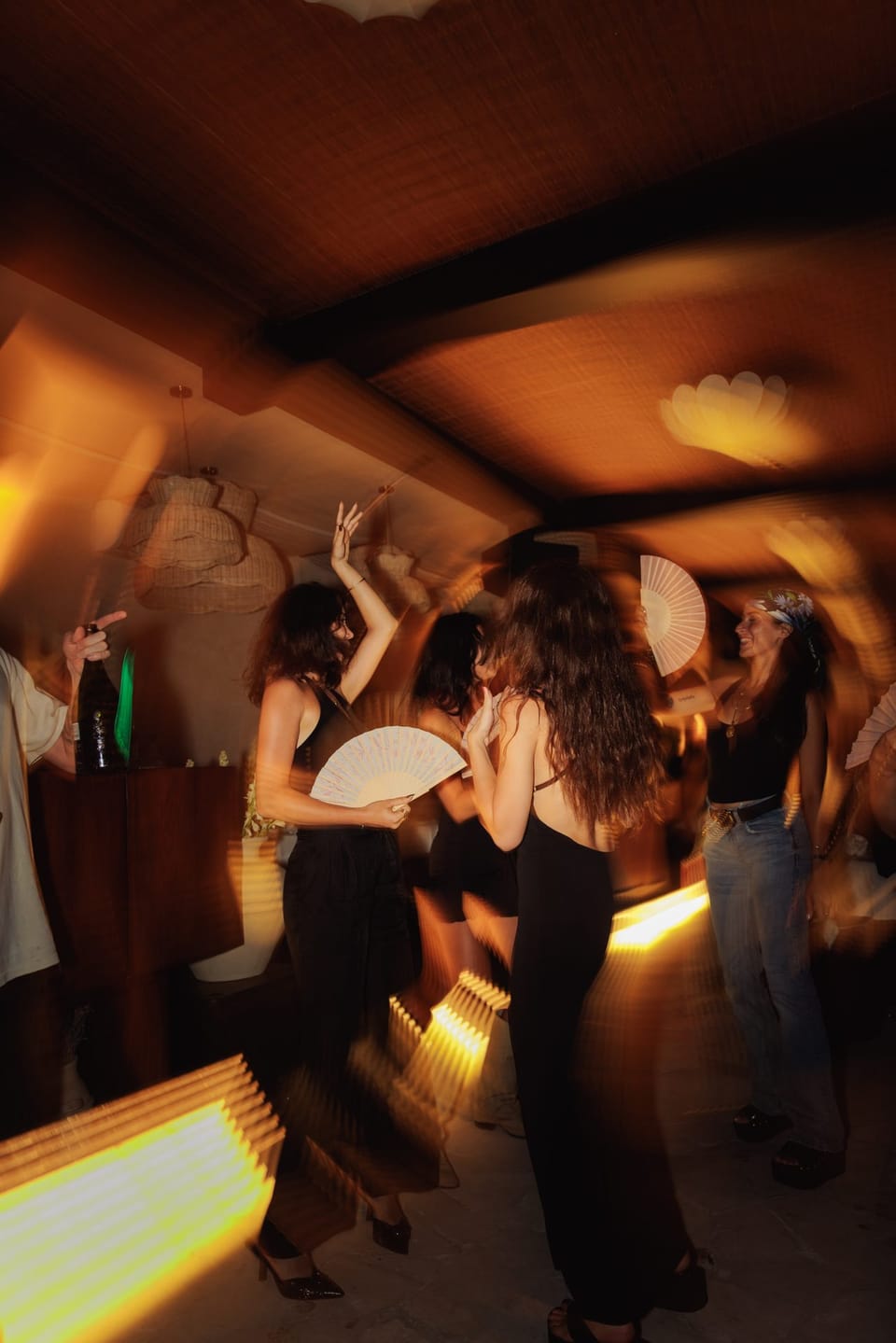 Guests dancing at Giselle at night
