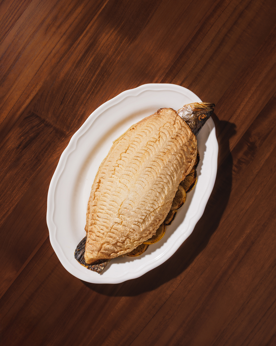 Barramundi in Salt Crust, Flambéed, Beurre Blanc Noilly Prat