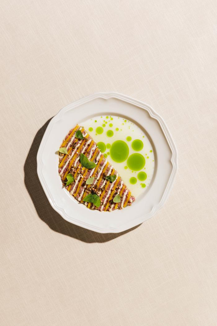 Angus Beef Tartare , Cured Egg yolk, Parmesan Aioli 